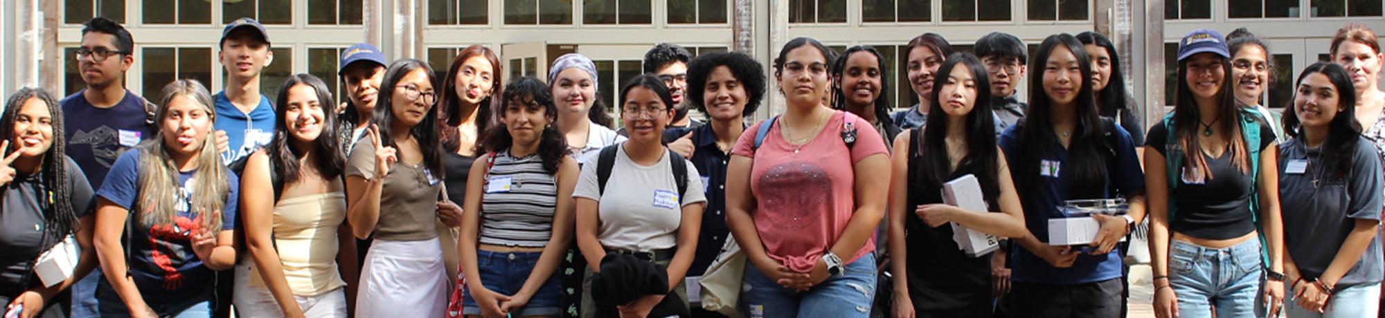Scholars in front of Dutton Hall